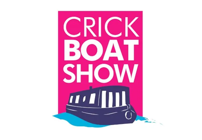 Logo of Crick Boat Show featuring a stylized canal boat on water below bold white text on a pink background.